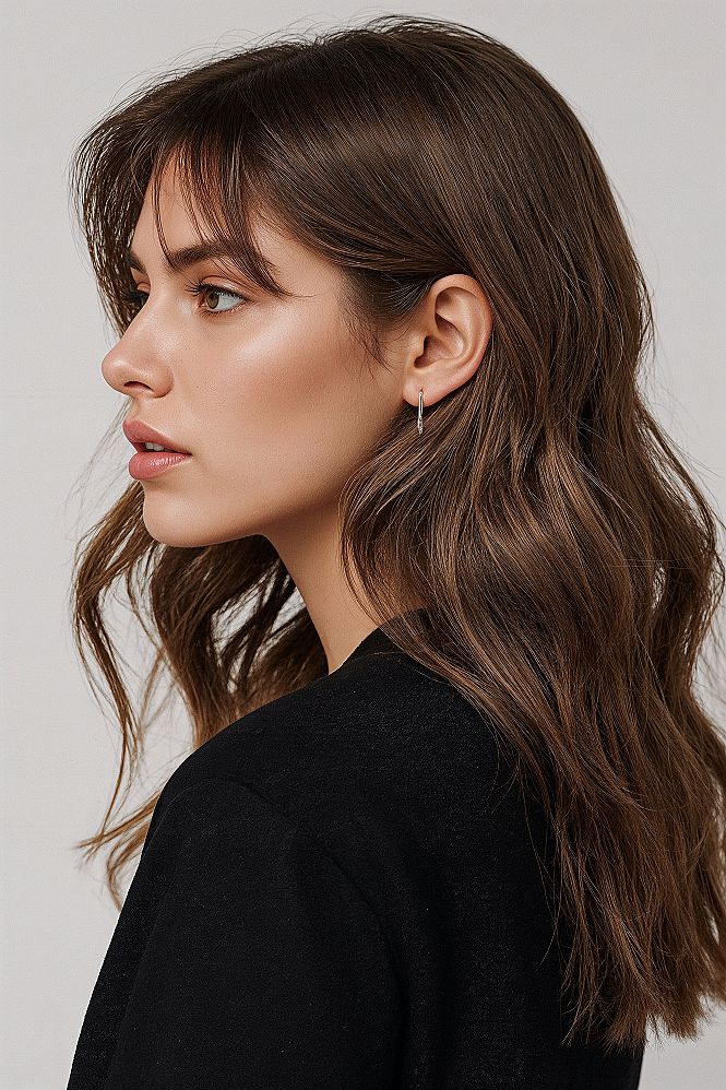 Flattering Face-Framing Fringe: Long Haircut with Curtain Bangs