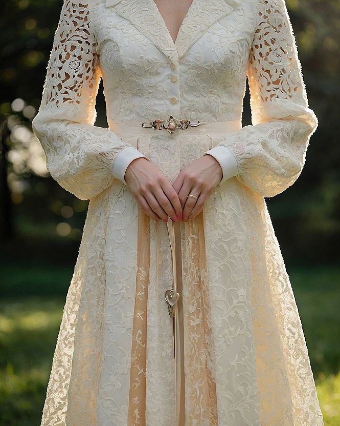 Selecting Long Lace Gowns With Bow Accents and Full Sleeves
