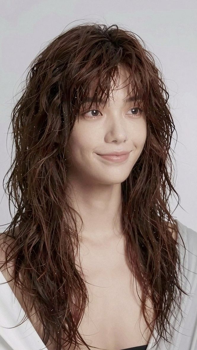 Choosing Long Curly Haircuts With Textured Bangs