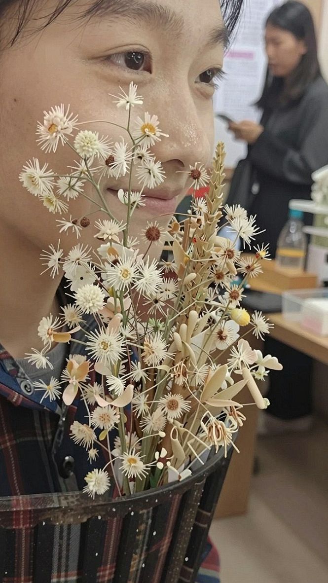 Choosing the Right Floral Accent for Your Wavy Braided Bun