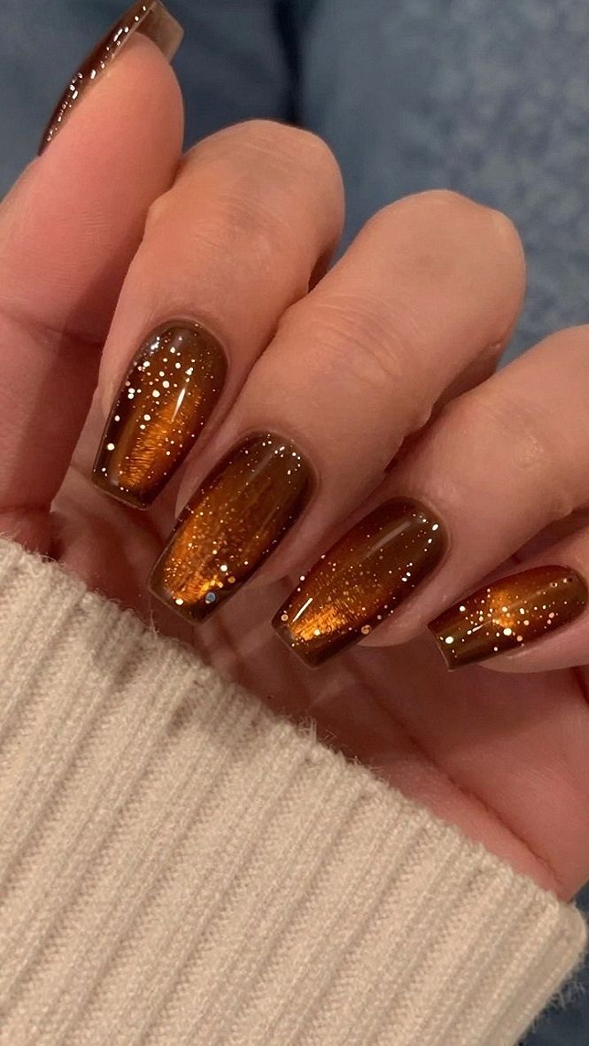 Choosing Between Magnetic Cat Eye and Simple Glitter Amber Nails