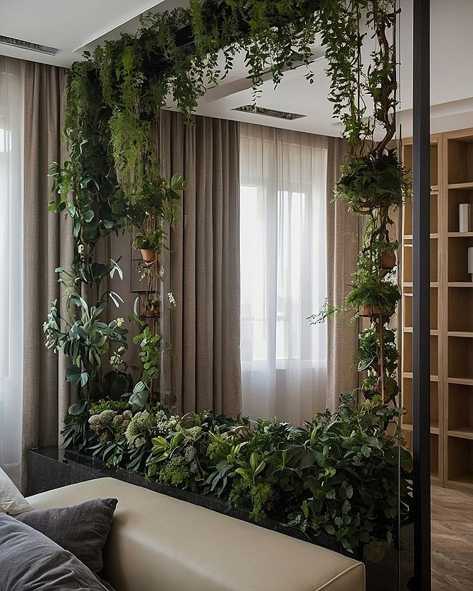Hanging green vines framing a soft taupe and ivory interior