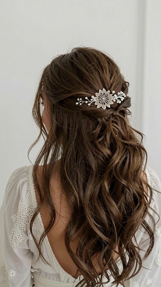 Securing a Statement Floral Hair Comb in Wavy Dark Tresses