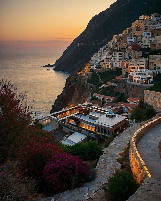 Rugged Cliffside Architecture Nestled Below DUSK Skies