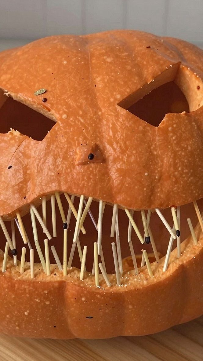 Adding Spooky Wooden Toothpick Teeth to Jack O Lanterns