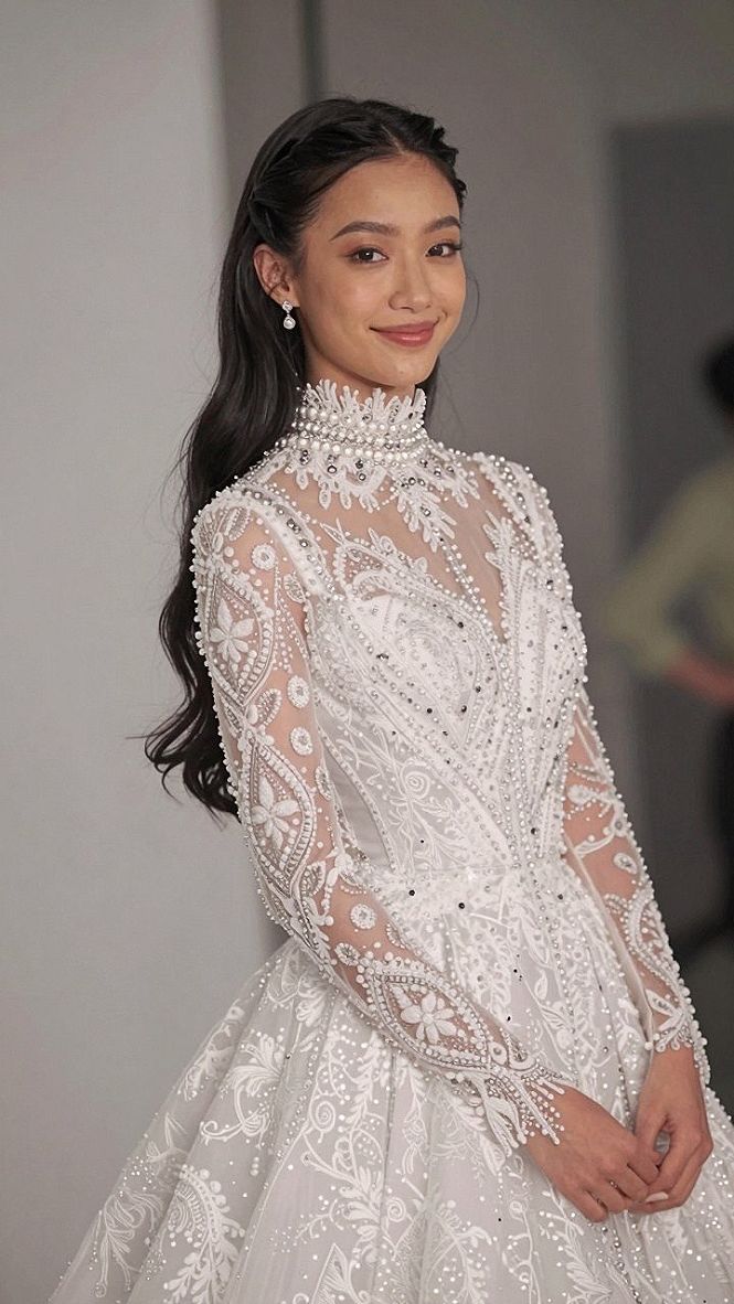 Embracing a High Collar Beaded Wedding Gown Design