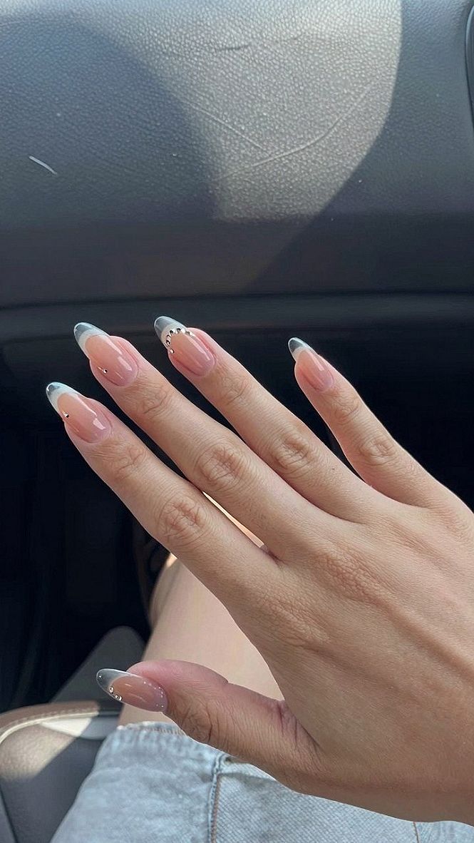 Adding Subtle Gem Accents to Red and Neutral Nails