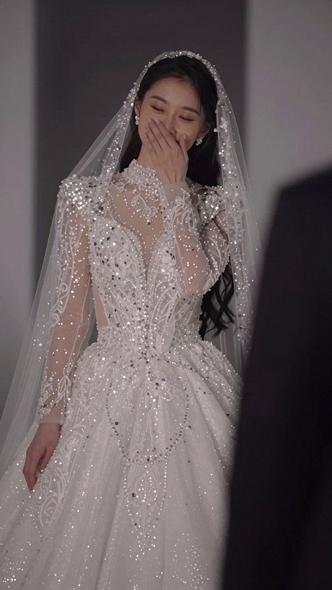 Embracing High Neckline Gowns with Crystal Embellishments