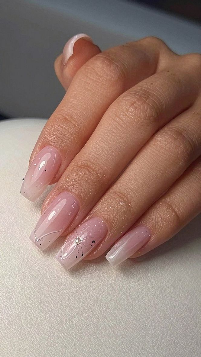 Adding Delicate Floral Accents to Pastel Pink Tips