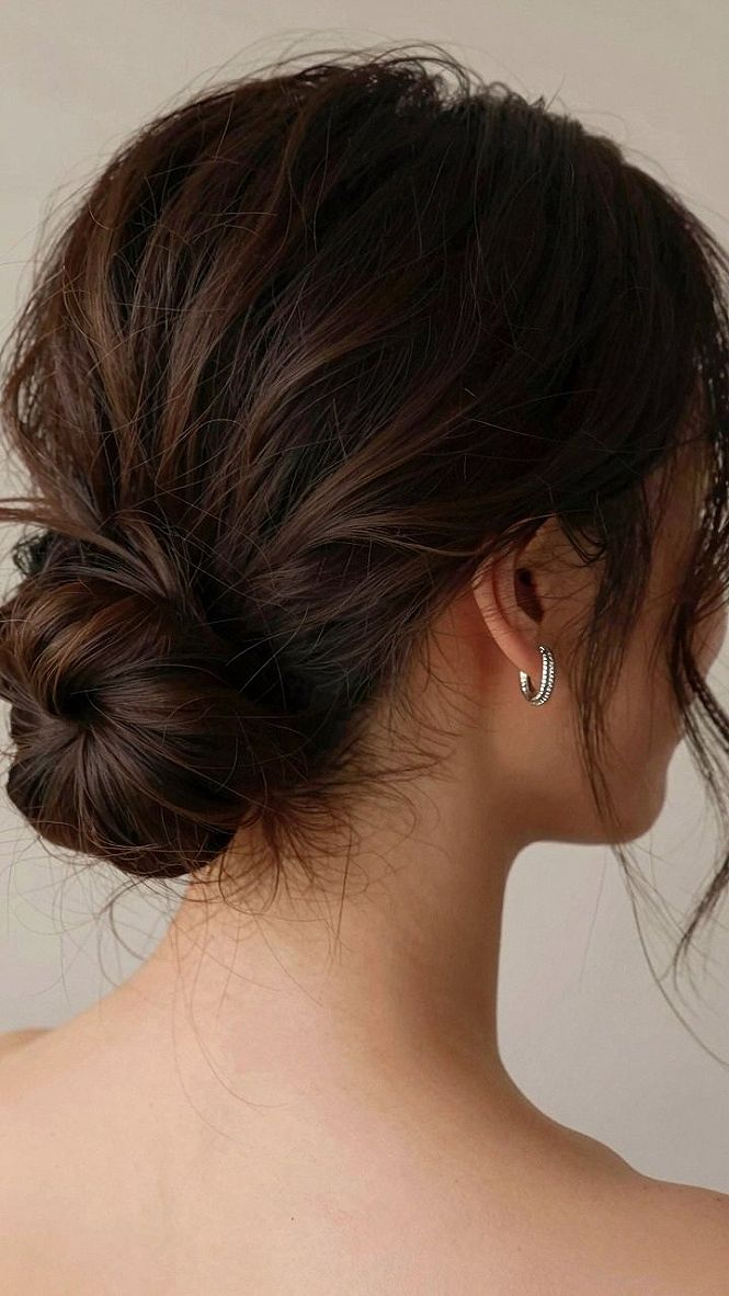 Adding Soft Texture to a Low Bun for Prom Night