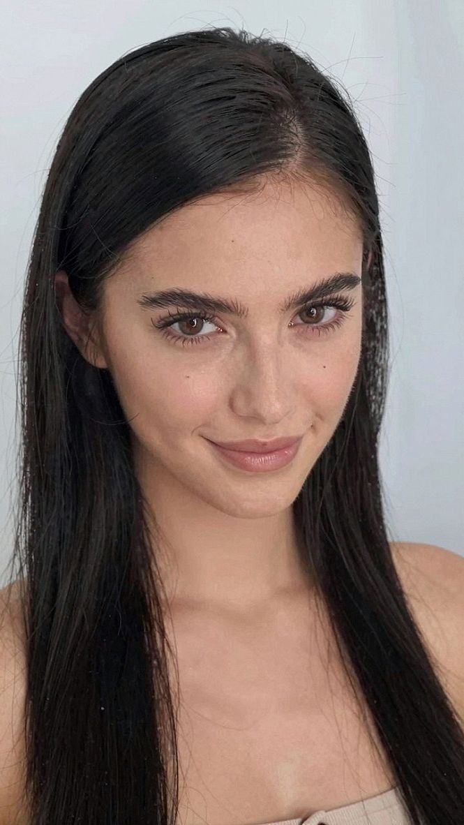 Sleek Straight Long Hair With a Center Part