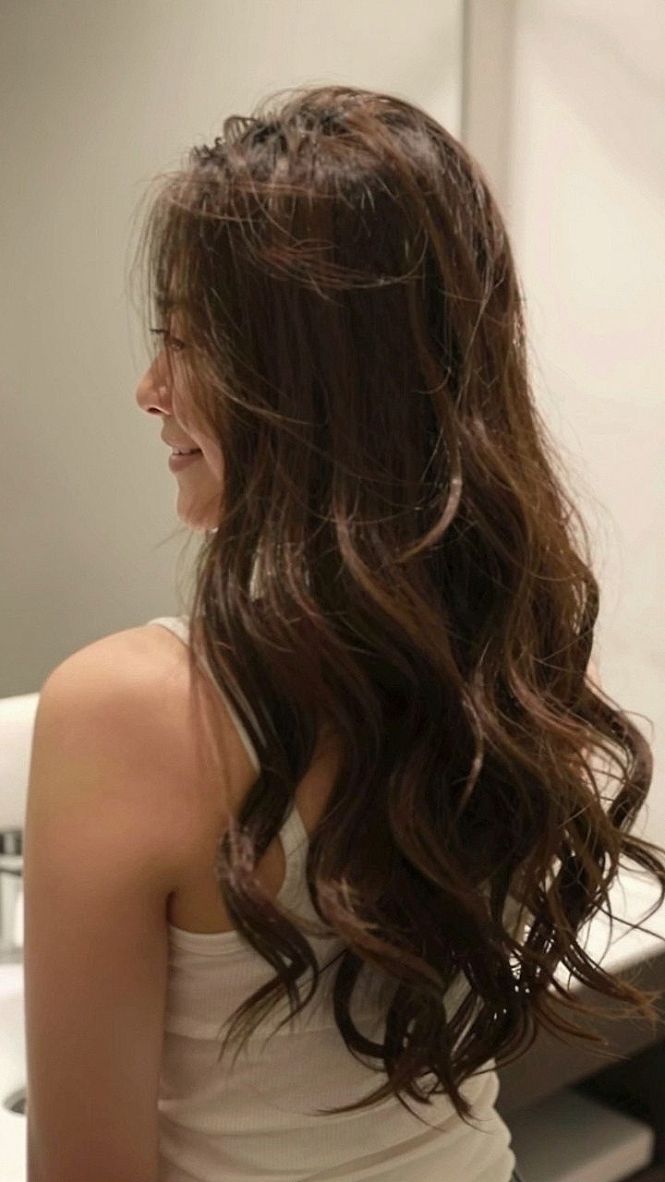 Adding Subtle Braids to Voluminous Wavy Hair