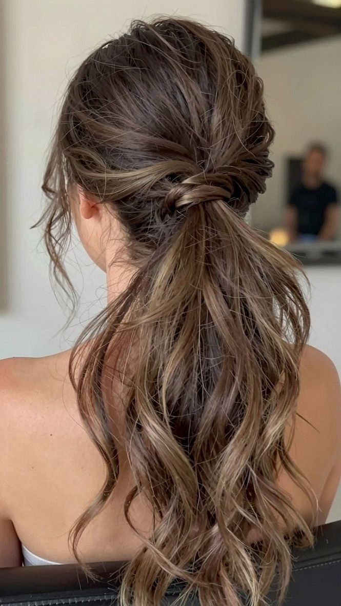 Textured Low Ponytail with Wrapped Detail for Brunette Brides