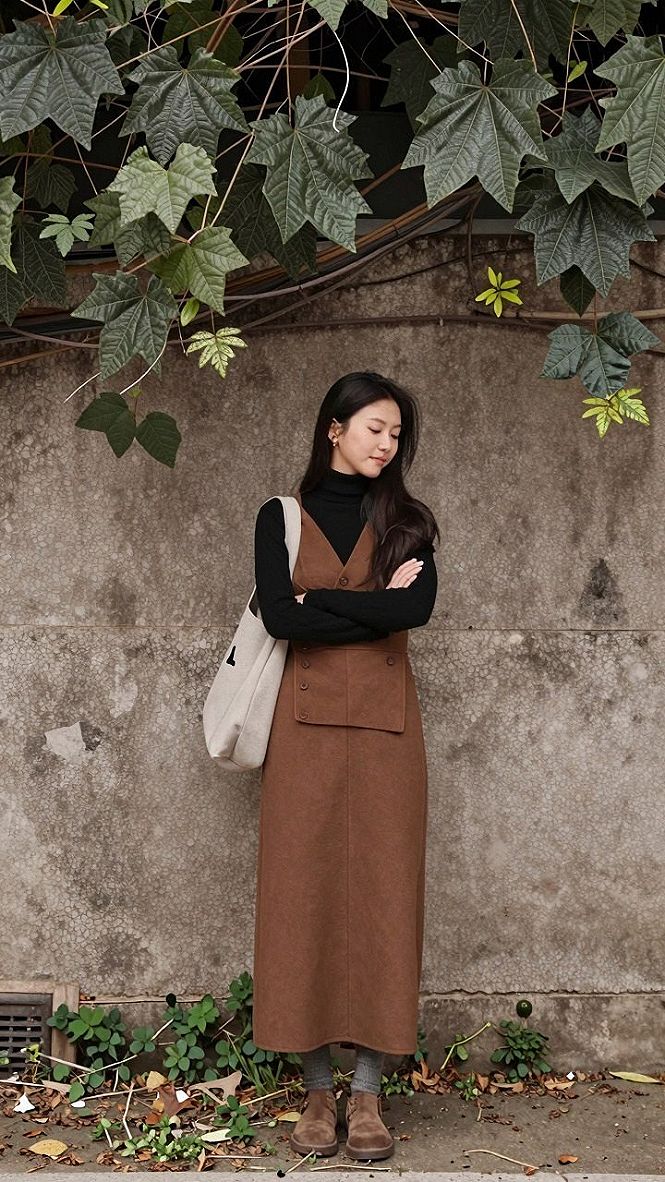 Adding an Oversized Leather Biker Jacket to Your Midi Skirt