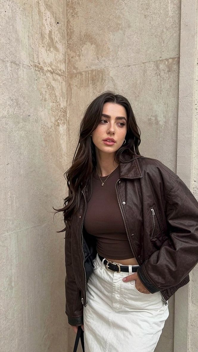 Styling an Oversized Leather Bomber with a Denim Skirt