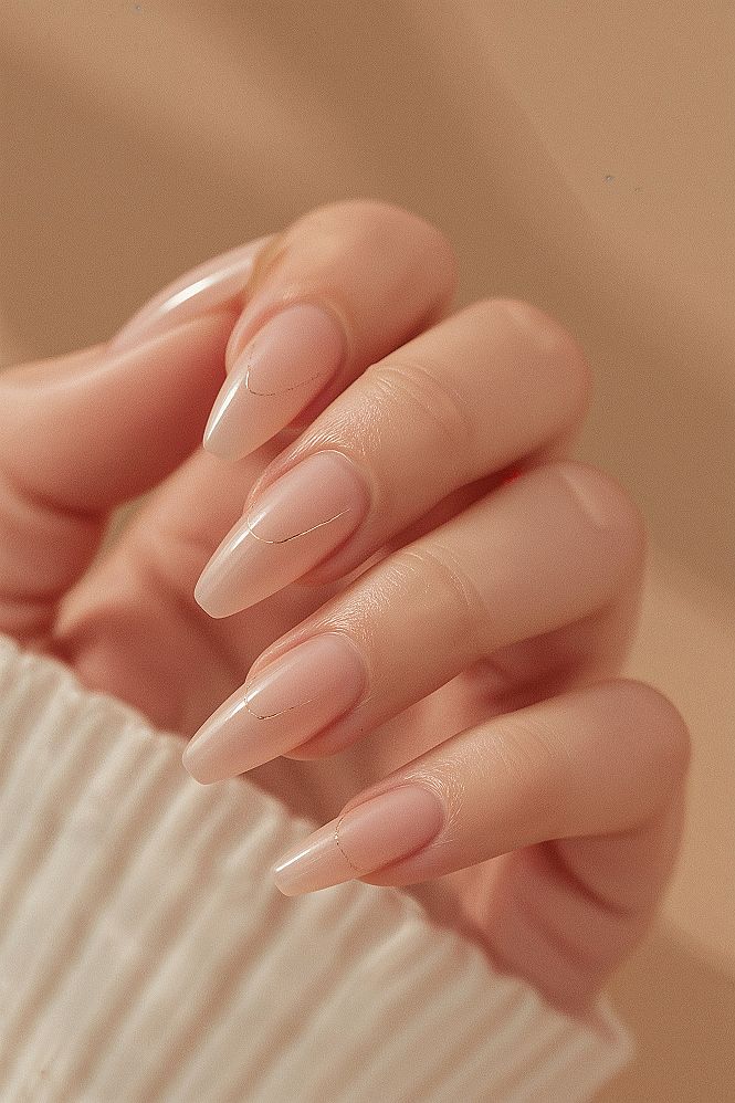 Classy Nude & Gold Almond Nails: Minimalist Elegance