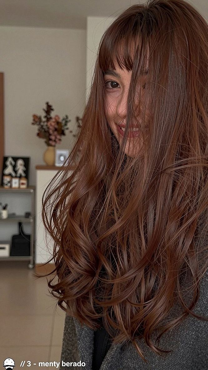 Pairing Soft Auburn Hair with Straight Bangs