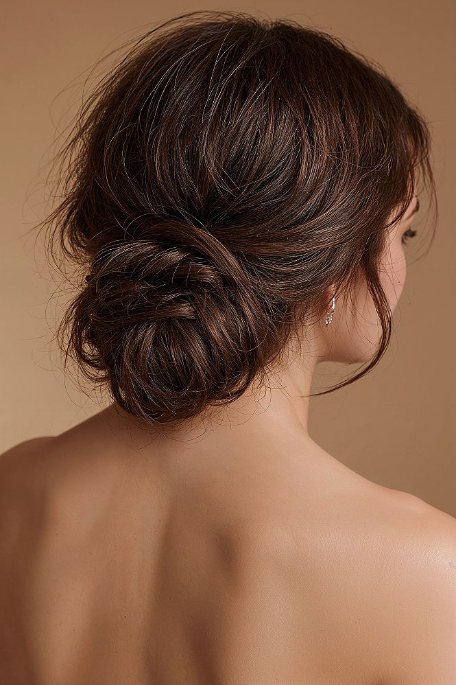 Effortless Messy Low Bun for Brunette Long Wedding Hair