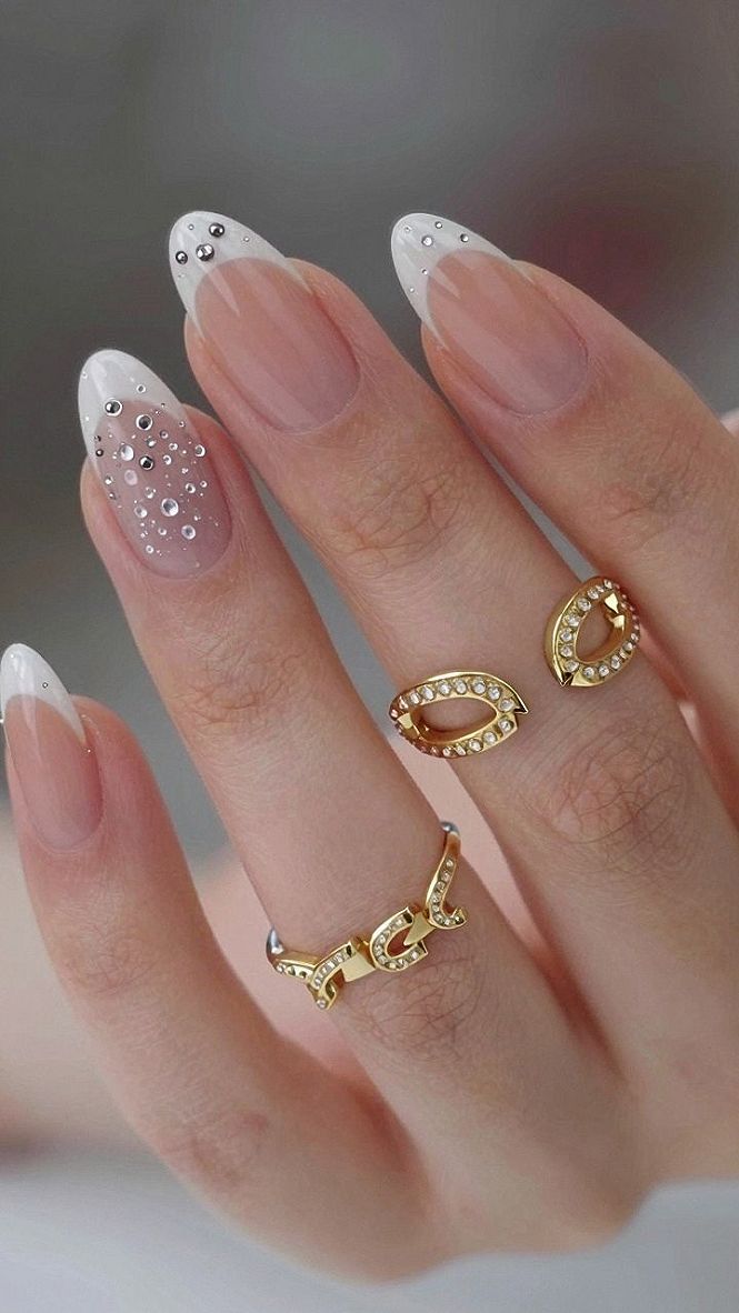 Adding Delicate Rhinestone Accents to Almond Nail Art