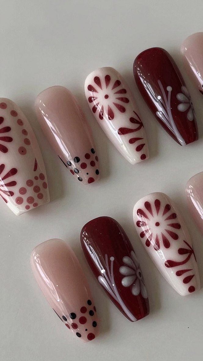 Maintaining Hand-Painted Wine Red Floral Nails