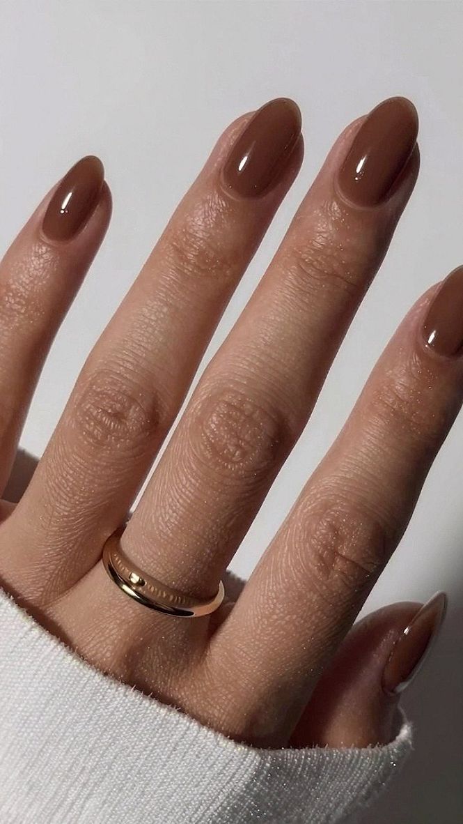Keeping Chocolate Brown Almond Nails Simple and Glossy