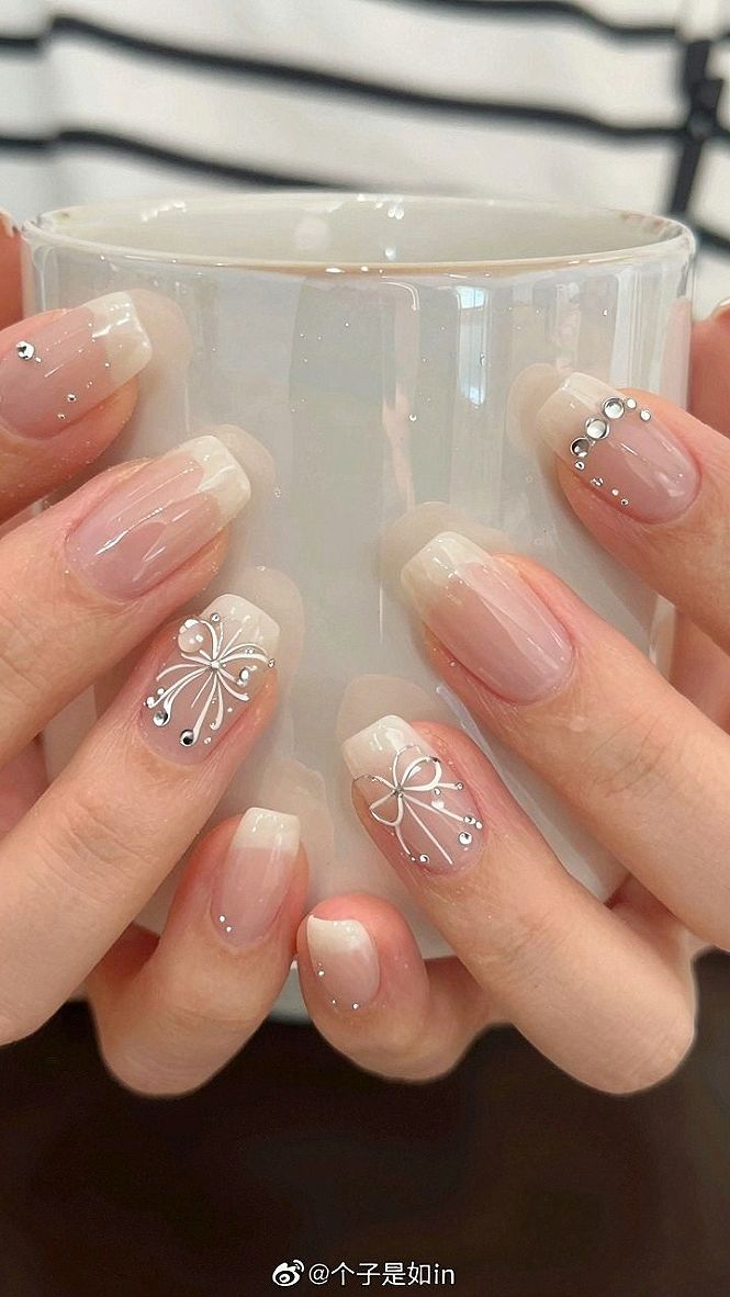 Pairing Milky White Nails with Delicate Bow Details