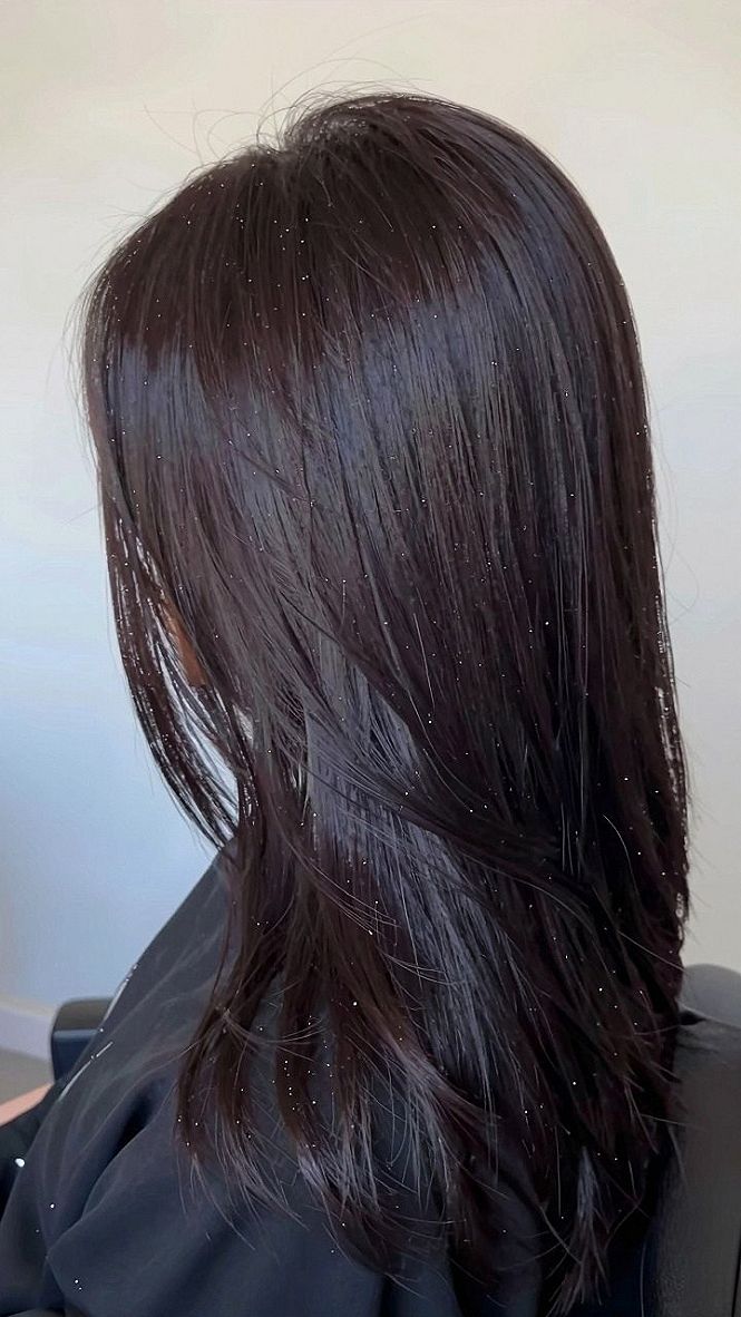 Adding Sparkling Hair Tinsel to Deep Red Strands