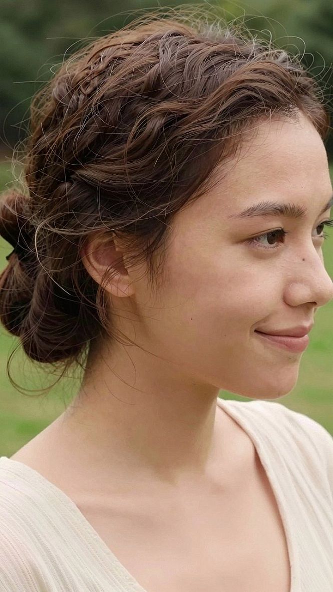 Deciding on a Soft Wavy French Twist Low Bun Style
