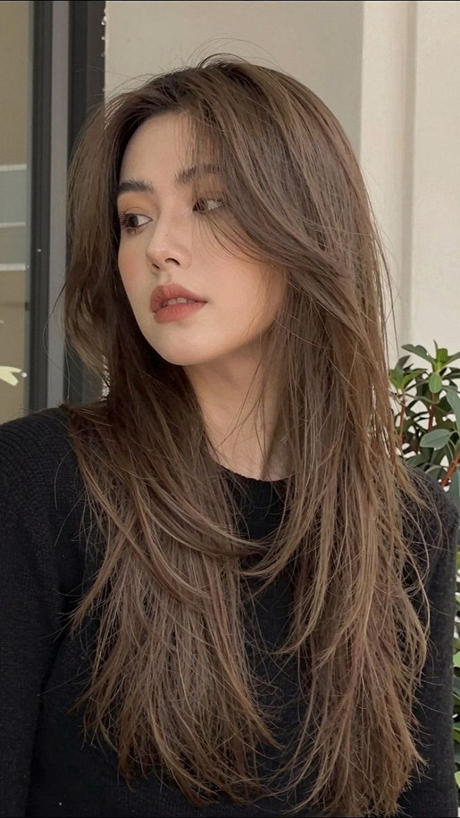Maintaining Long Layers and Bangs Between Salon Visits