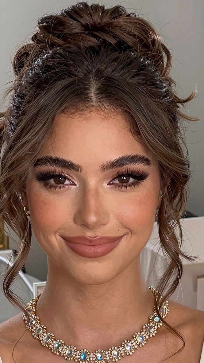 Securing a High Bun Updo With Your Veil