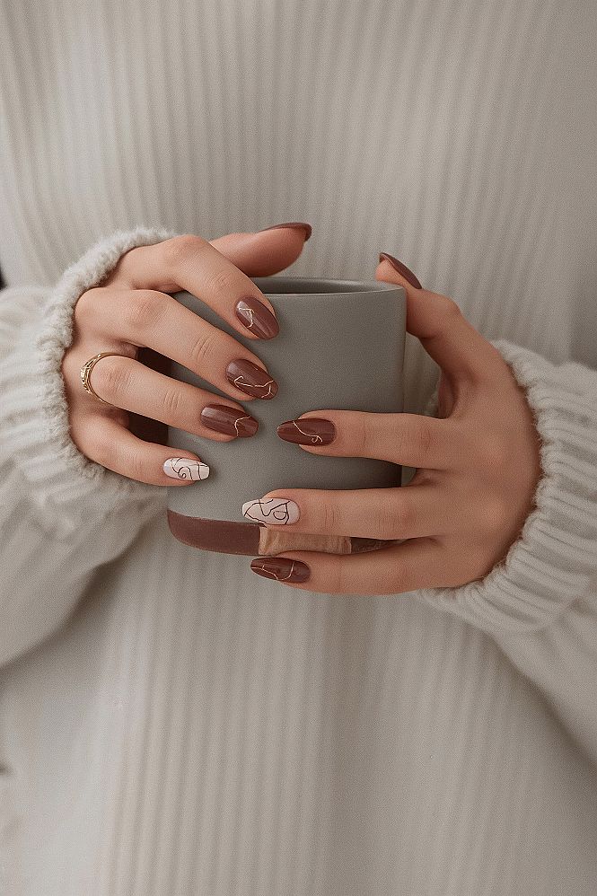 Cozy Winter Nails: Chic Brown & Nude with Abstract Gold Accents