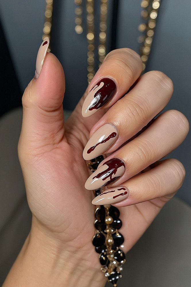 Minimalist Nude Base With Crimson Drip Nail Art
