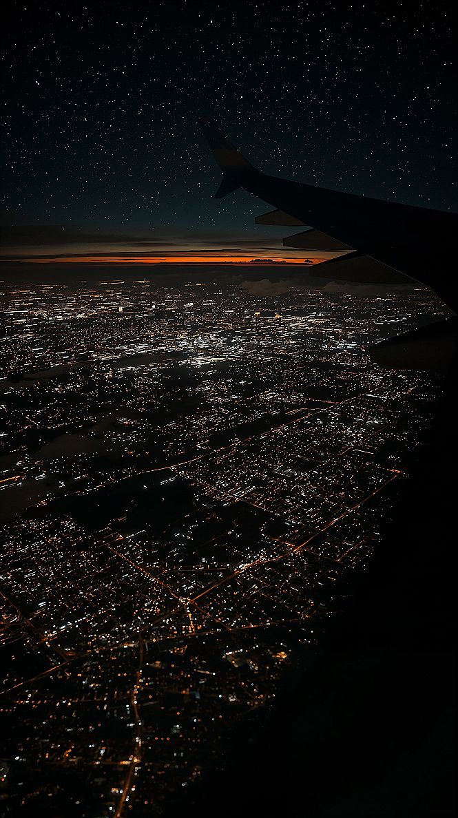 Magical City Lights: Nighttime Aerial Views from Aesthetic Plane Windows