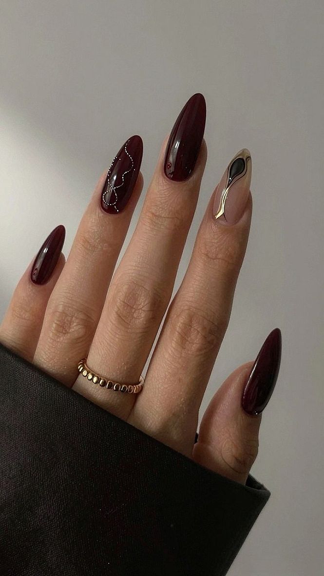 Choosing Between Solid Burgundy and Aura Accent Nails