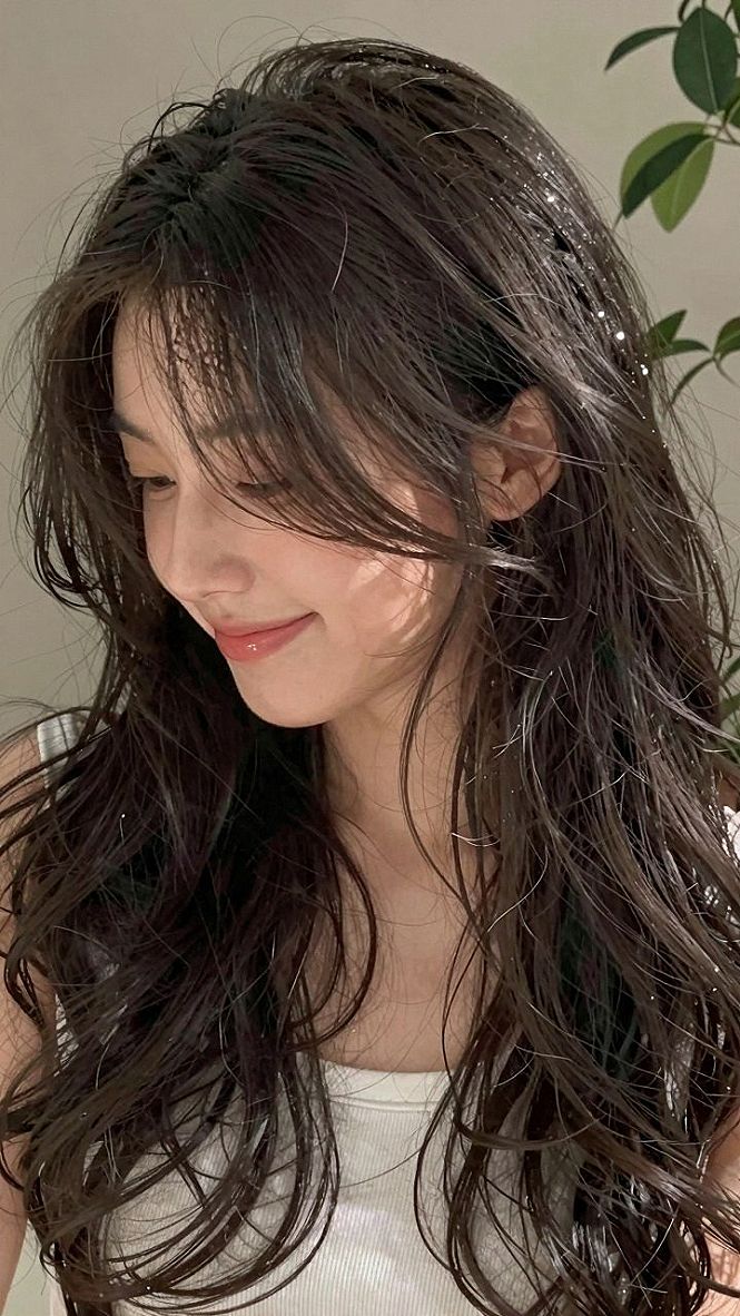 Choosing Soft Wavy Hair with Textured Bangs for Celebrations