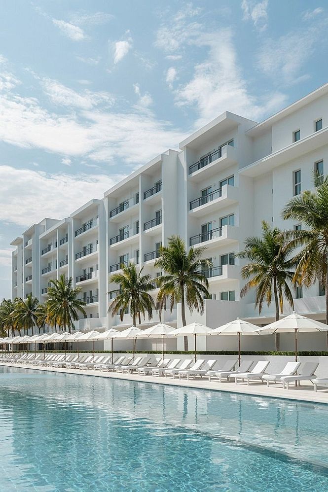 Luxury Oceanfront Resort: Modern Pool & Tropical Ambiance