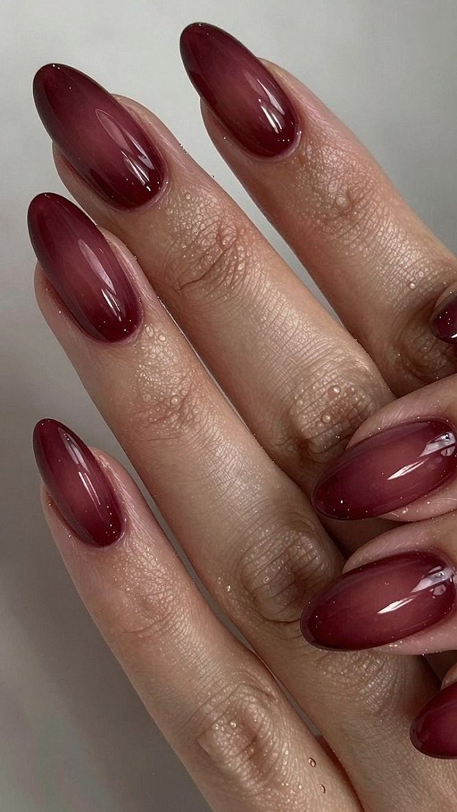 Maintaining Burgundy Cat Eye Aura Almond Nails