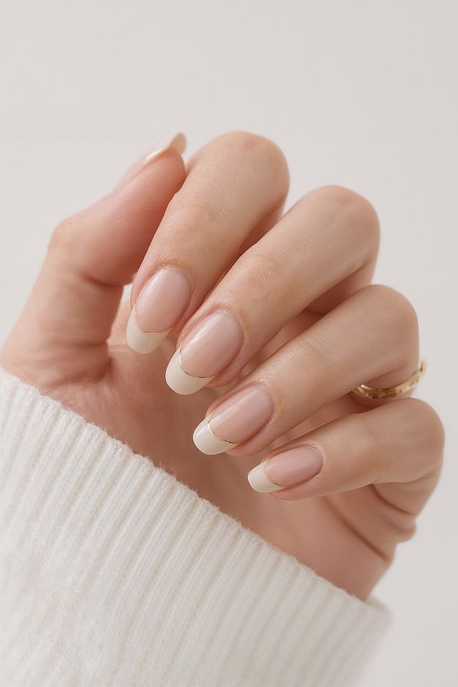 Modern Nude Almond Nails: Professional & Classy with Gold Tips
