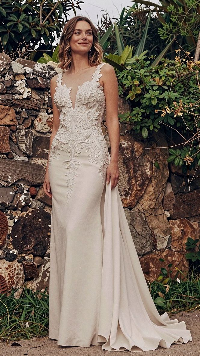 Embracing a Fitted Bridal Gown with Detachable Train