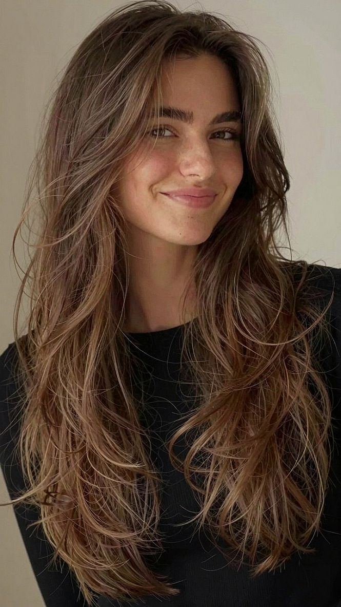 Styling Long Layered Hair With Sweeping Fringe