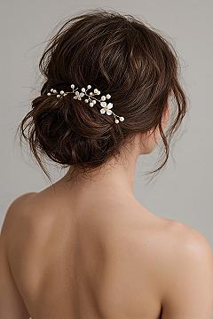 Romantic Bridal Updo: Effortless Wedding Day Bun with Floral Accents