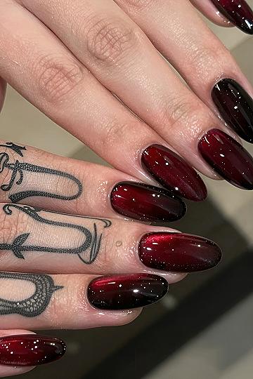 Dark Red Cat Eye Nails With Magnetic Polish