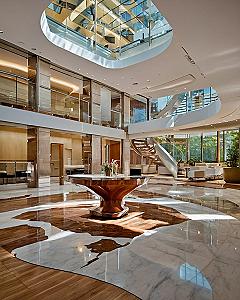 Grand Foyer with Sculptural Table and Marble Inlay