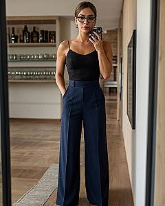 What makes wide-leg navy trousers so appealing?