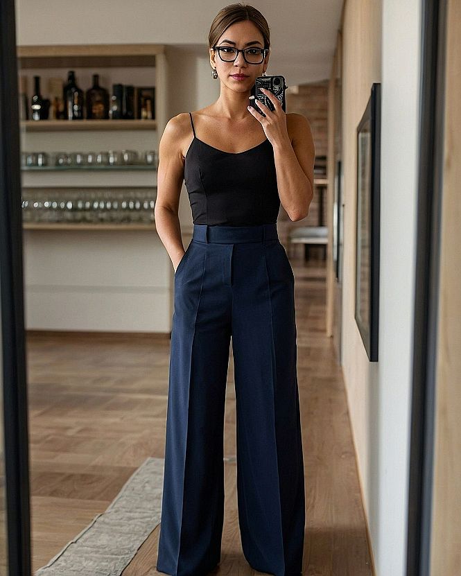 What makes wide-leg navy trousers so appealing?