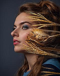 Why wheat stalks and feathered textures create striking floral portraits