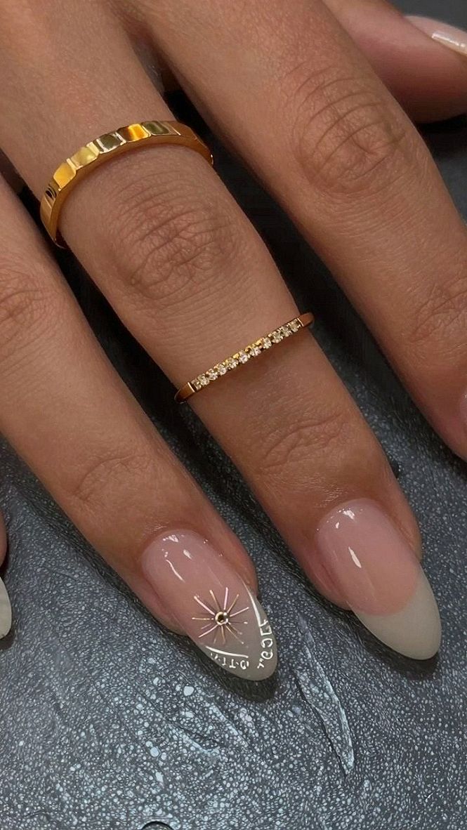 Black French Tip Almond Nails with Celestial Star Details