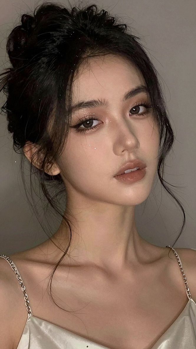 Softly Curled Updo With Wispy Front Strands