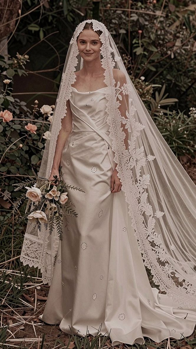 Pairing a Cathedral Lace Veil with an Open Back Gown