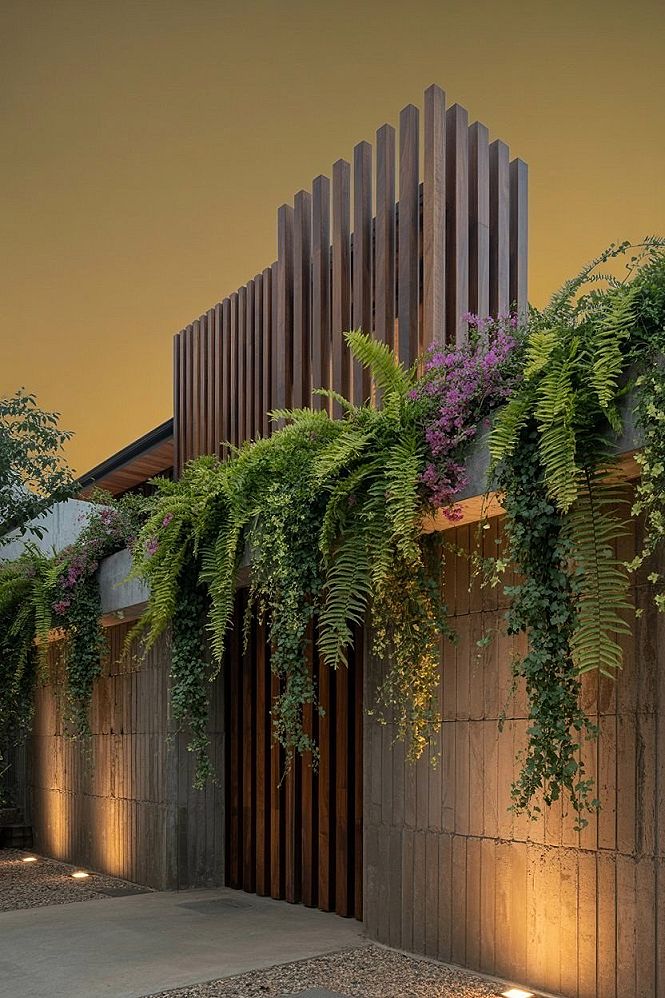 Luxury Modern Home Entrance: Elegant Landscaping & Statement Gate